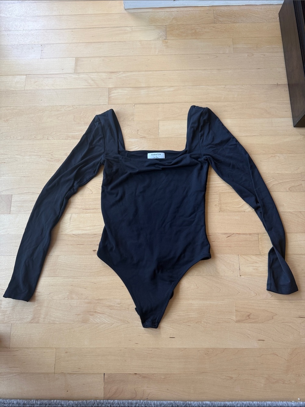Babaton Black Long-Sleeve Square One-Piece Bodysuit Aritzia